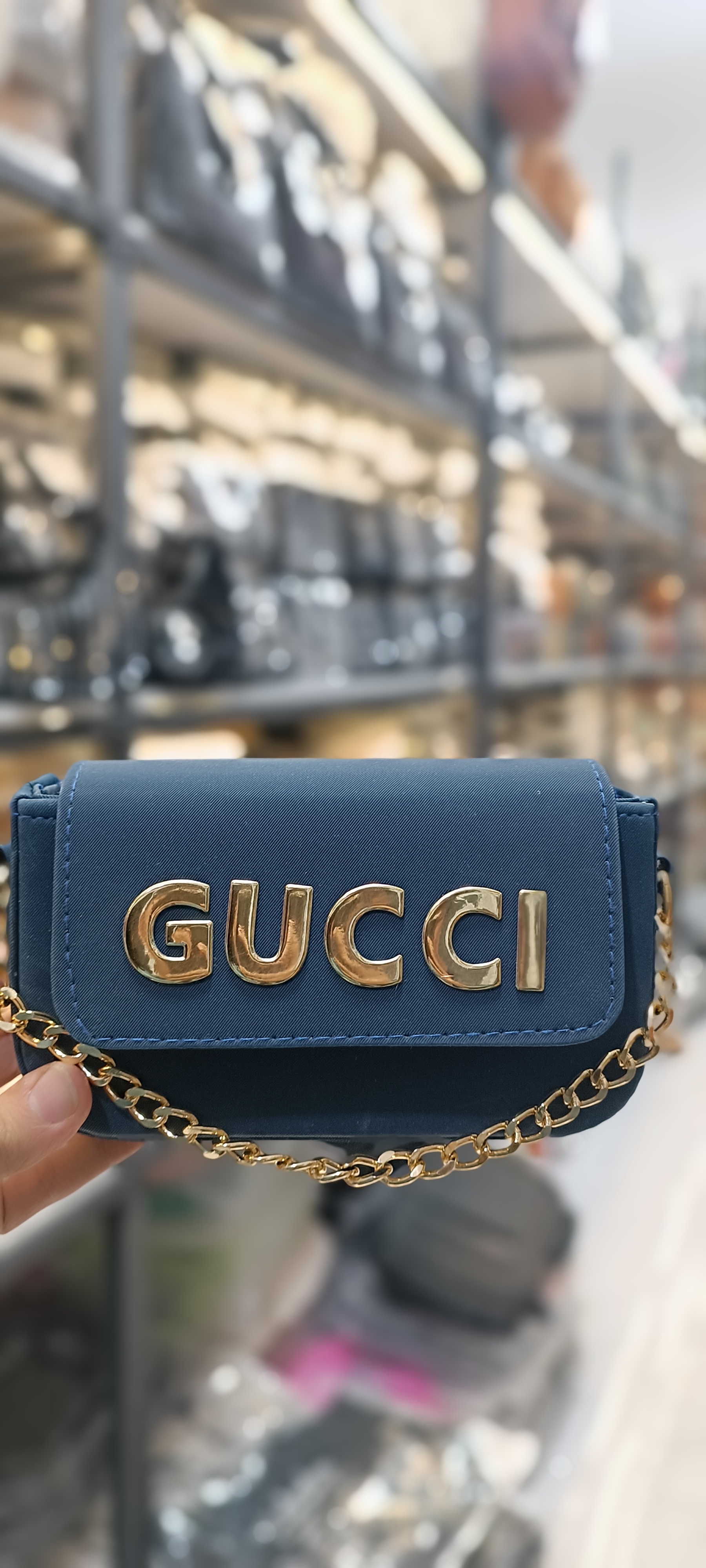 گوچی پاسپورتی